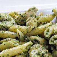 Baked Chicken Pesto · Penne pasta tossed with fresh basil pesto and grilled chicken breast. Topped with mozzarella...