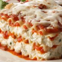 Lasagna · Lasagna layered with Ricotta Cheese, Pasta Sauce, Mozzarella, topped with Italian Sausage; s...