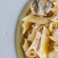 Carbonara  · Penne tossed with Alfredo Sauce, Grilled Chicken Breast, Mushroom, Red Onion, and Bacon; top...