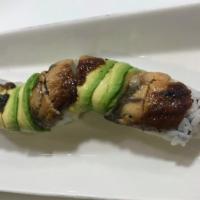Dragon · Eel & avocado on top of shrimp tempura, crab and cucumber with eel sauce.
