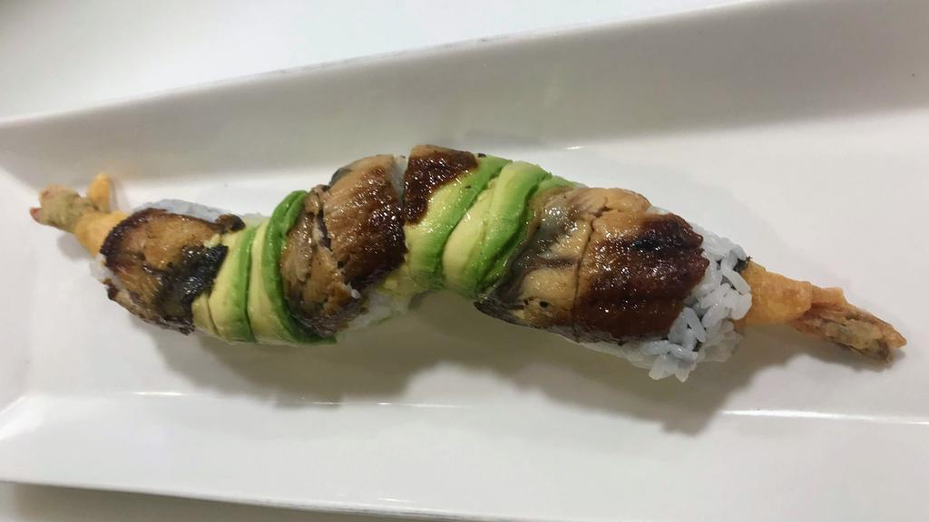 Dragon · Eel & avocado on top of shrimp tempura, crab and cucumber with eel sauce.