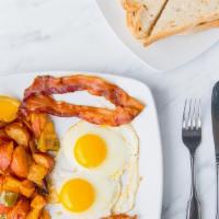 Two Eggs · Two fresh grade AA large eggs cooked any style. Served with your choice of home fries, hash ...