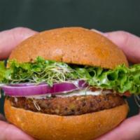 Veggie Burger · Artisan style vegan patty made with whole grains, all natural product made locally. High lev...