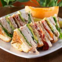 Country Club · All natural deli turkey breast, bacon, lettuce, tomatoes, avocado and rosemary aioli on gril...