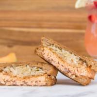 Salmon Reuben Sandwich · Grilled salmon, 1000 Island dressing and sauerkraut on grilled rye bread