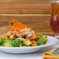 Chicken Caesar Salad · Crisp romaine lettuce, baked croutons and fresh parmesan cheese tossed in our own Caesar dre...