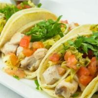 Fish Tacos · Grilled choice of Mahi Mahi, Salmon, Crispy Cod or Shrimp with tomatoes, cilantro and marina...