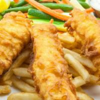 Fish And Chips · Icelandic cod prepared with malt vinegar. Served with your choice of two sides and two garli...