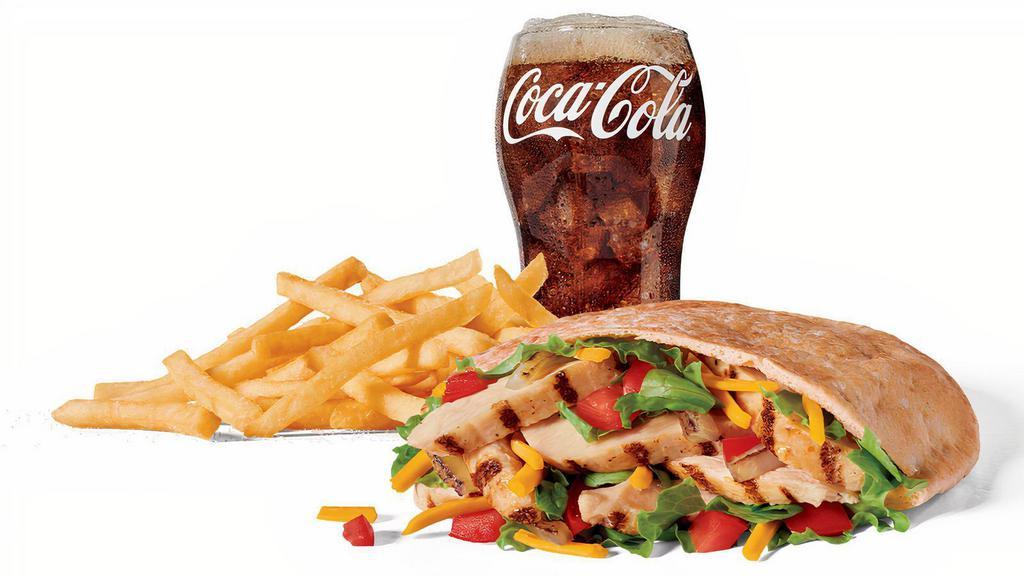 Large Chicken Fajita Pita Combo · Includes large French Fries and your choice of large drink.