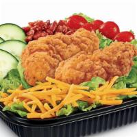 Chicken Club Salad (Crispy) · Iceberg and romaine lettuce blend topped with Crispy Chicken Strips, diced bacon, cucumber s...