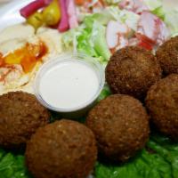 #13 Falafel Plate · Vegan,. Mix of golden fried fava beans and garbanzo with garlic, onions, herbs and spices. S...