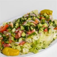 Mediterranean Salad # 15  · Chopped lettuce, tomatoes, cucumbers, radishes, onions, parsley with toasted pita bread, lem...