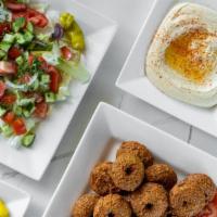 Family Vegan Veggie Meal Special · Vegan falafels 16 pieces with veggies and tahini, Mediterranean salad, and a side of hummus,...