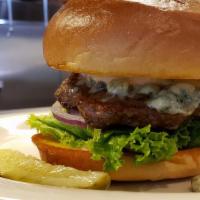 Blue Moo · On a grilled Kaiser bun, crumbled blue cheese, Moo sauce, lettuce, tomato, and onions.