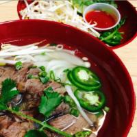 Beef Noodle Soup · Served with Cilantro, Bean Sprout, Jalapeño, Green Onion,  White Onion and Lime.