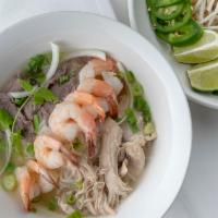 House Noodle Soup (Shrimp, Beef & Chicken) · Served with Cilantro, Bean Sprout, Jalapeño, Green Onion,  White Onion and Lime.