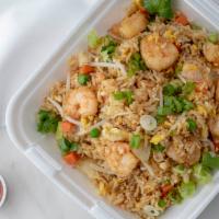 Shrimp Fried Rice · Made with Egg, Green Onion, White Onion, Pea and Carrot.
