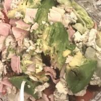 Cobb Salad · Turkey, ham, bacon, tomatoes, avocado, blue cheese crumbles, egg and croutons.
