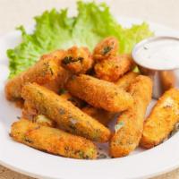 Fried Zucchini · Breaded and seasoned fresh zucchini, served with garlic ranch.