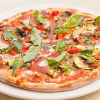 Grilled Vegetarian Pizza · Seasonal grilled vegetables such as eggplant, zucchini, red onions, bell peppers with roaste...