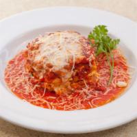 Meat Lasagna · With seasoned meat, tomato sauce, fresh herb, ricotta, mozzarella and Parmesan.