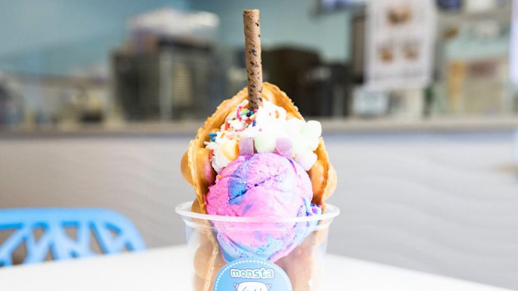 Unicorns Are Real · Cotton Candy ice cream, rainbow mochi, whip cream, sprinkles, topped with a chocolate wafer stick