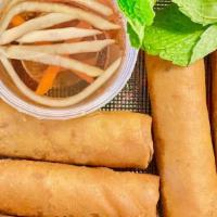 Egg Rolls (6) · Seasoned ground pork, carrots, jicama, and taro
wrapped and fried in an egg roll shell. Vege...