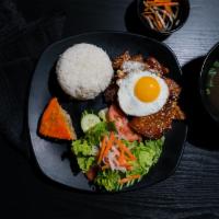 Com (Rice Plate) · Steamed white rice with a side of our house salad.