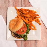 Mushroom Swiss Burger & Fries · Our homemade 1/2 lb. fresh beef pattie seasoned and grilled to perfection, topped with sauté...