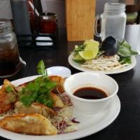 Potstickers 6 Pcs   (Bành Xếp) · Minced pork and vegetable potstickers served w/vinegar soy dipping sauce
