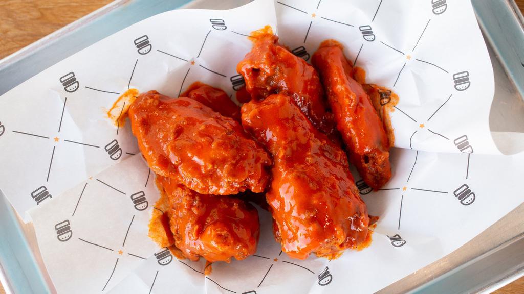 Chicken Wings · 6 Chicken Wings.  Sauce available are:
BBQ, Buffalo, Sweet Crunchy Garlic, and Garlic Parmesan