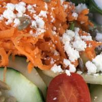 Cucumber Salad · tomato, carrots, spinach, feta, sunflower seeds, pecorino, Sharon’s balsamic dressing