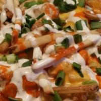 Buffalo Fries · Fries with melted Cheddar cheese, Mozzarella cheese, Pepper Jack cheese topped with boneless...