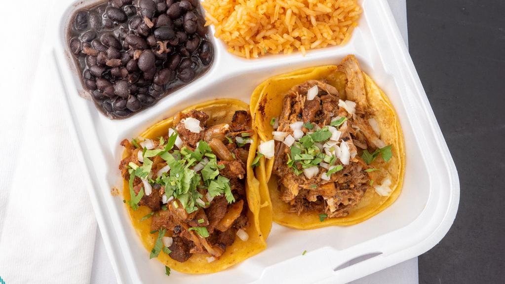Chicken Taco Combo  · Two soft tacos, choice of meat, rice and beans.