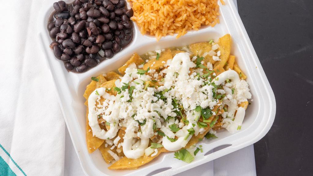 Chicken Chilaquiles  · Fried corn tortillas. Then sauteed with a mild green tomatillo salsa. Topped with onions, cilantro,sour cream, and queso fresco. With a side of rice and beans.