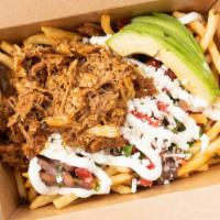 Asada Mexican Fries · Beef/Asada Fries topped with beans, onions, tomatoes, cilantro, sour cream, queso fresco, an...