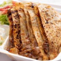Pastor Quesadilla · Pork marinated in adobo grilled with onion and pineapple . Flour tortilla with melted Oaxaca...