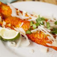 Fish (Fillet Of Sole) · Very lightly spiced, marinated, and cooked on skewers in our clay tandoori oven on a bed of ...