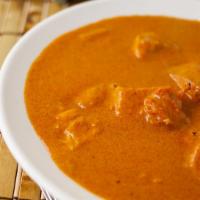 Chicken Curry · A traditional tomato base curry from South Asia.