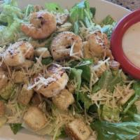 Caesar Salad · Add chicken, shrimp, or NY strip steak for an additional cost.