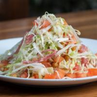 Chopped Salad · Lettuce, tomatoes, garbanzo beans, salami and provolone cheese. Add chicken for an additiona...