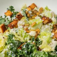 Caesar Salad · We source organic products when available. Organic romaine, kale toasted pepitas, cotija che...