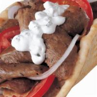 Gyro Sandwich · The authentic original Gyro Sandwich wrapped in Beef Lamb Gyro slices, tomato, onion, and Tz...