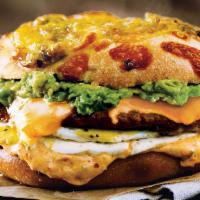 Chorizo Sunrise Egg Sandwich · Green Chile Gourmet Bagel with chorizo sausage, avocado, pepper jack cheese, cage-free eggs ...