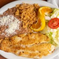 Camarones A La Plancha · Grilled shrimp. Served with refried beans, rice, and salad.
