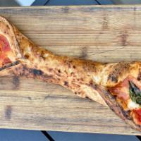 Pizza Gondola  · Gondola shape pizza with crushed tomatoes, home made mozzarella, parmigiana cheese, ricotta ...