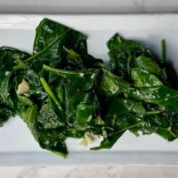 Spinaci · Fresh sautéed spinach with garlic and olive oil.