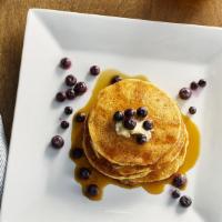 Organic Vegan Pancakes · Yellow corn with blueberries.