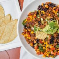 Beyond Taco Salad Bowl · Plant-based taco “meat”, black beans, organic corn, green cabbage, red pepper, jalapeños, on...