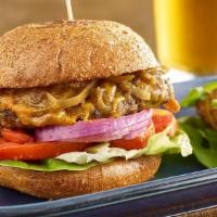 Grass-Fed Wagyu Beef Burger · Pasture raised beef patty, caramelized onions, lettuce, tomato, horseradish sauce, Tillamook...